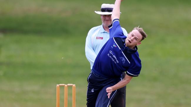 Jake Rigby of Mount Waverley bowling.Picture: George Sal