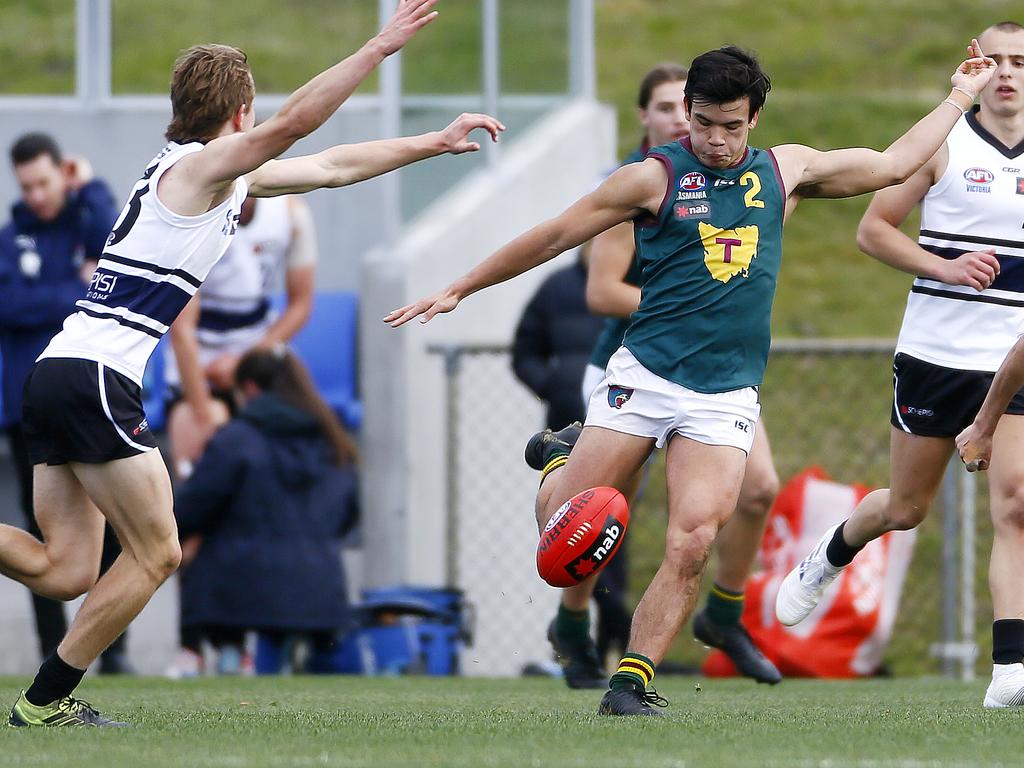 AFL - Tasmania Devils under-18 team in NAB League game against the Northern Knights at Twin Ovals, Kingston. (L-R) Oliver Burrows-Cheng gets the ball away. Picture: MATT THOMPSON