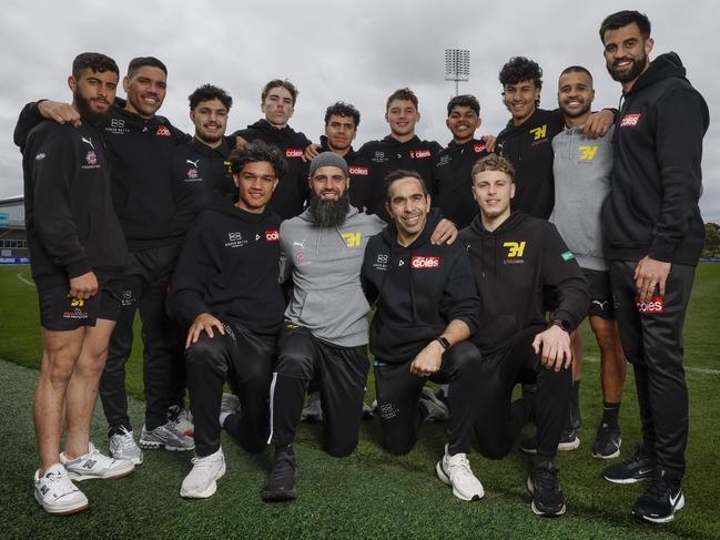 Eddie Betts and Bachar Houli with some of the boys from the Eddie Betts Foundation and the Bachar Houli foundation who are playing against each other at Punt Rd on Friday night. Picture: Michael Klein