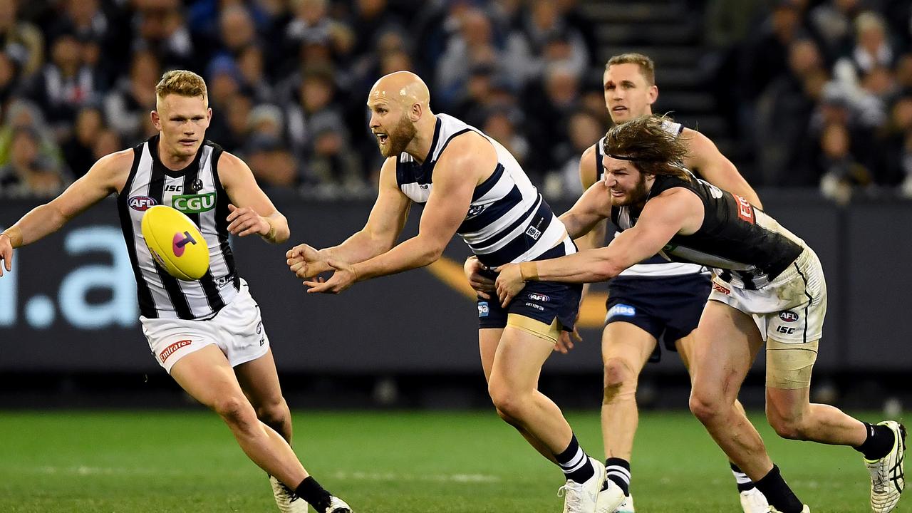 Fans were struggling to tell Geelong and Collingwood players apart at the MCG. Photo: Quinn Rooney/Getty Images.