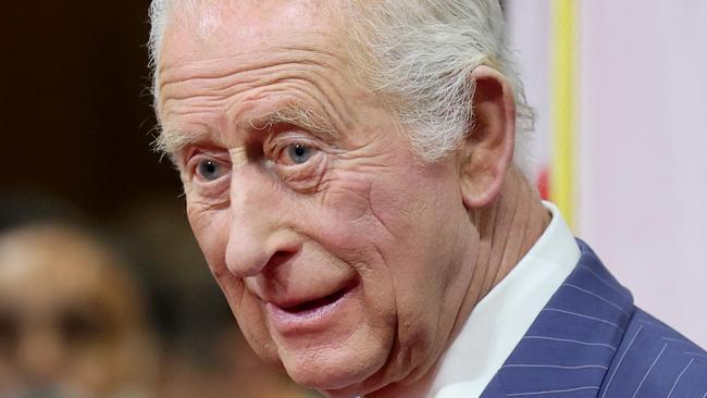 OTTAWA, ONTARIO - MAY 27: King Charles III smiles as he stands in the Senate Chamber for the State Opening of Parliament during an official visit to Canada on May 27, 2025 in Ottawa, Ontario. It is The King's 20th and Queen's 5th tour of Canada, with their previous visit being in 2022. (Photo by Chris Jackson - Pool/Getty Images)