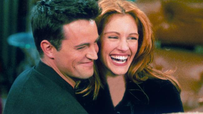 Roberts with Friends star Matthew Perry while she filmed her episode. Picture: Liaison