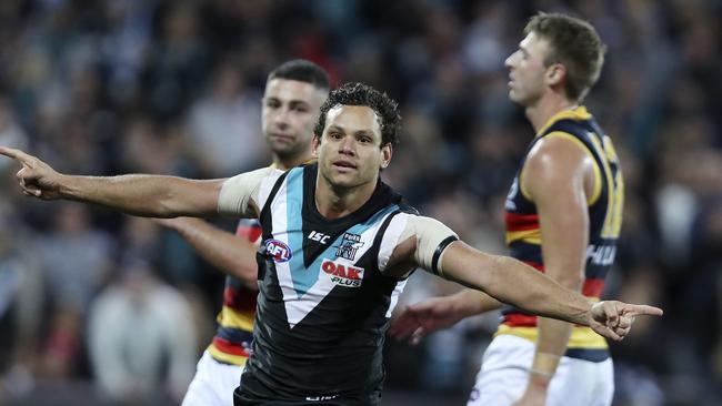 Steven Motlop kicks the winning goal against the Crows in Showdown 44. Picture Sarah Reed