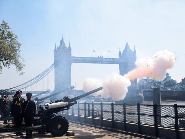 Members of the Honourable Artillery Company stand guard during the fire of the 62 Gun Royal Salute for the Queen's Birthday, near Tower Bridge, in central London. Picture: AFP