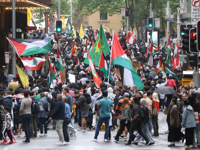 SYDNEY, AUSTRALIA - NewsWire Photos SEPTEMBER 29, 2024: Protesters gather at Town Hall in Sydney to call for peace and an end to the current Israeli occupation of Palestine and the ongoing war between the two nations, and the escalating assault on Lebanon after overnight airstrikes against Hezzbolah targets in the capital, Beirut.Picture: NewsWire / Damian Shaw