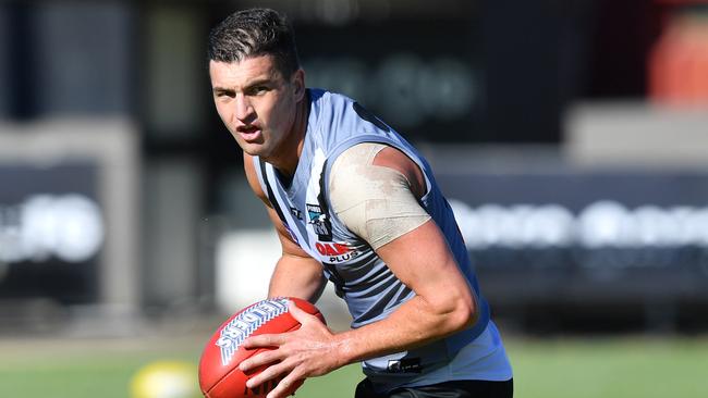 Tom Rockliff will face a fitness test after Port Adelaide arrives in China. Picture: AAP Image/David Mariuz.