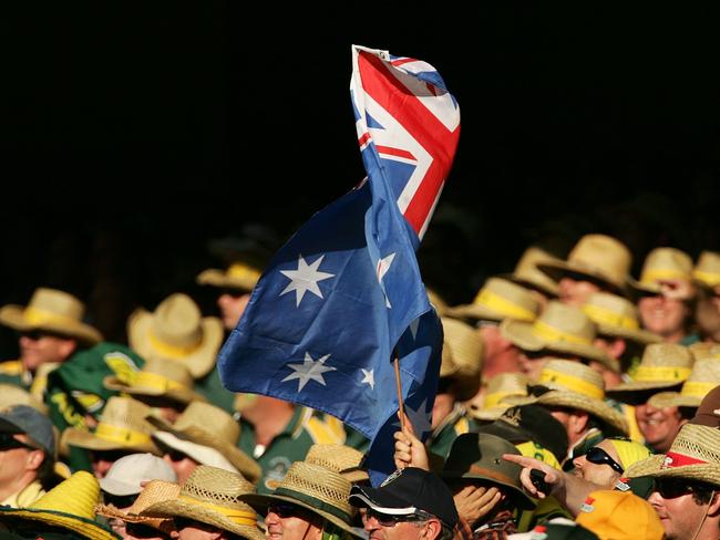 BRISBANE, AUSTRALIA - NOVEMBER 23:  The Australian flag flutters in the breeze during day one of the first Ashes Test Match between Australia and England at The Gabba on November 23, 2006 in Brisbane, Australia.  (Photo by Hamish Blair/Getty Images)