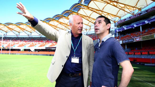 Tetsuro Koga is the Senior Director of Sales Planning for Tokyo 2020 and is inspecting Metricon Stadium with Dennis Mills CEO of Major Events International as part of an IOC sports delegates group on the Gold Coast. Pics Adam Head