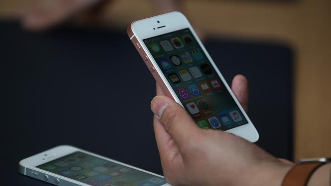 The SE’s screen is not only smaller but also packs in fewer pixels and noticeably less contrast than the iPhone 6s. Picture: AFP