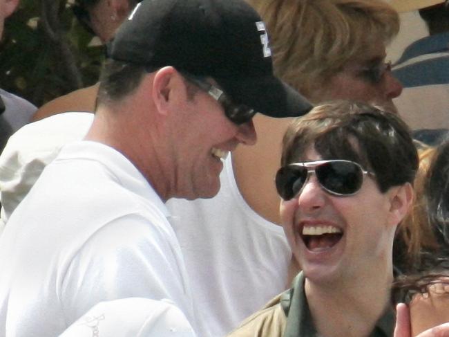 Actor Tom Cruise congratulates Australia's richest man James Packer (L) and fiancee Erica Baxter at beach party on Paloma Beach, St Jean de Cap Ferrat on French Riviera, with couple to marry in a sumptuous ceremony in Cote d'Azur area within the next week.