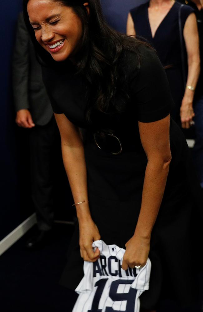 Meghan clearly loves the shirt! Picture: Getty Images