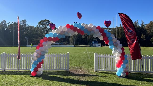 Players ran through a balloon arch displaying Sarah's name on the game day on Sunday.