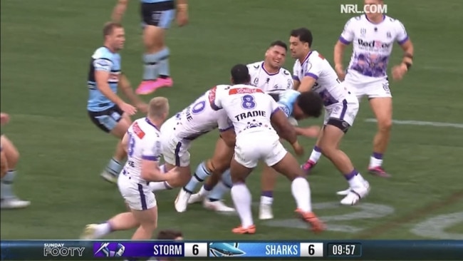 Eli Katoa reels away from the tackle.