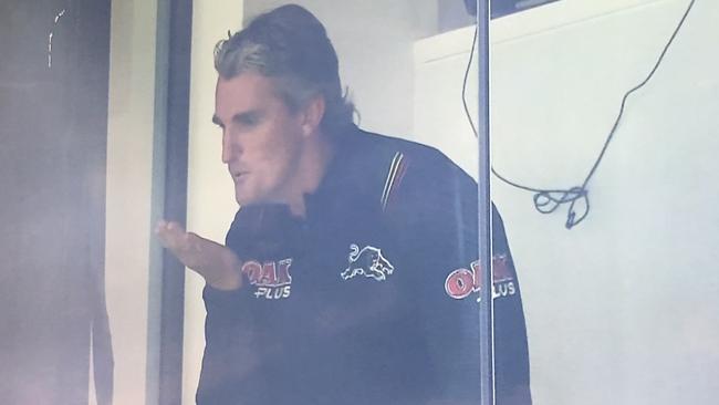 Panthers coach Ivan Cleary blows a kiss to a fan after his side beat Wests Tigers on Saturday night.