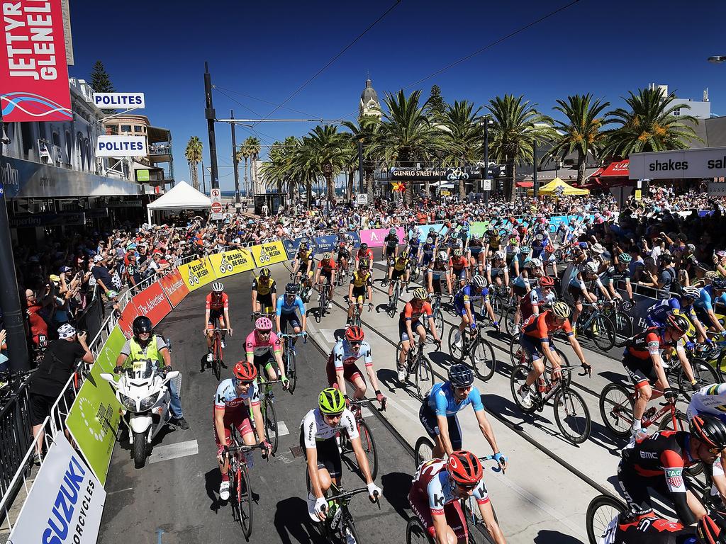 Riders compete in the neutral zone down Jetty Road, Glenelg at the start of stage three of the 2018 Tour Down Under. Picture: Daniel Kalisz/Getty Images