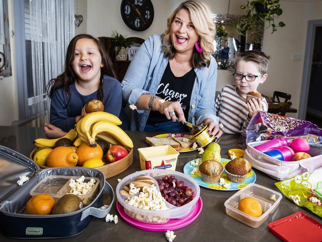 Chrissie with her kids Annabelle,7, and Seth, 5. Kids and parents reject schools teaching about food which says some food are good and other food bad. They also hate lunchbox monitoring and bans on sharing food. Instead families see food as communal, pleasurable and fun. Picture- Nicole Cleary