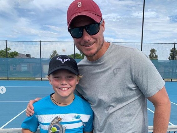 Cruz Hewitt as a boy with his dad.