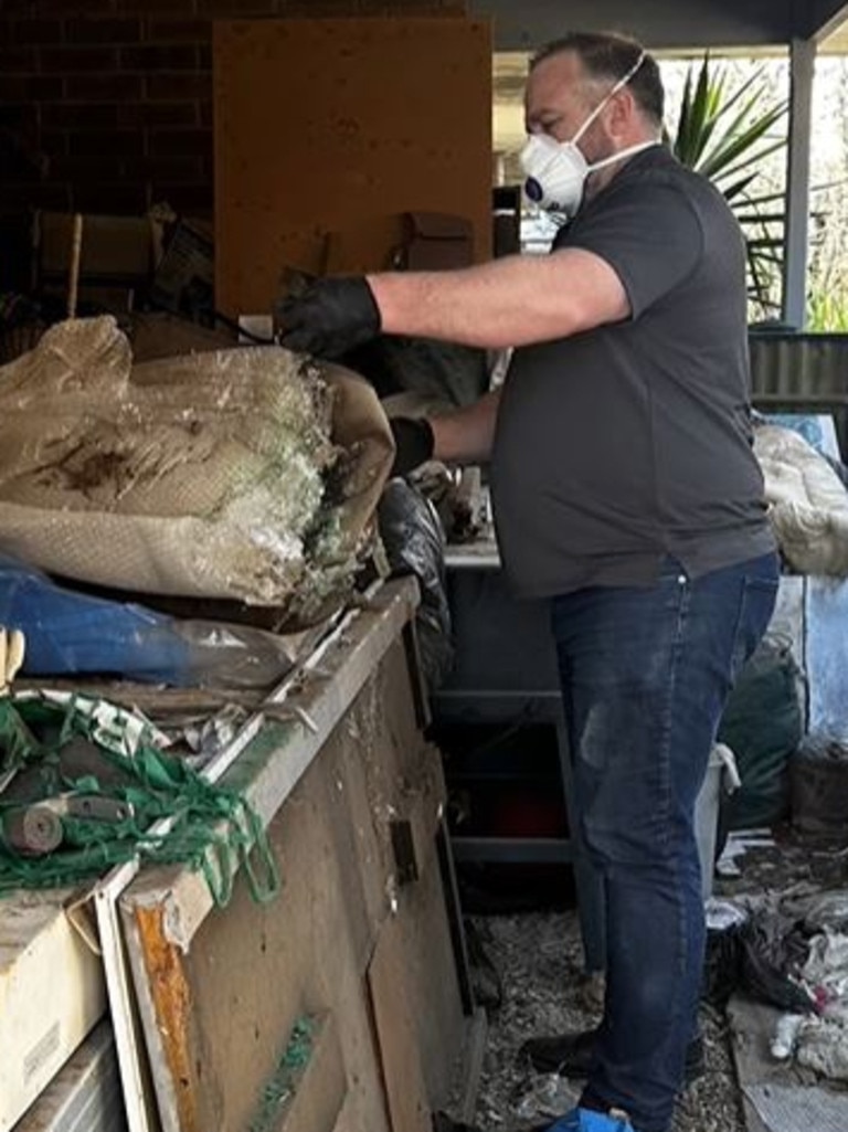 Volunteers cleaning up an 82-year-old veteran’s Adelaide house. Picture: Facebook.