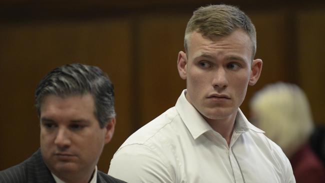 Matt Lodge in court with top Manhattan criminal lawyer Thomas Rotko. Picture: Alex Towle