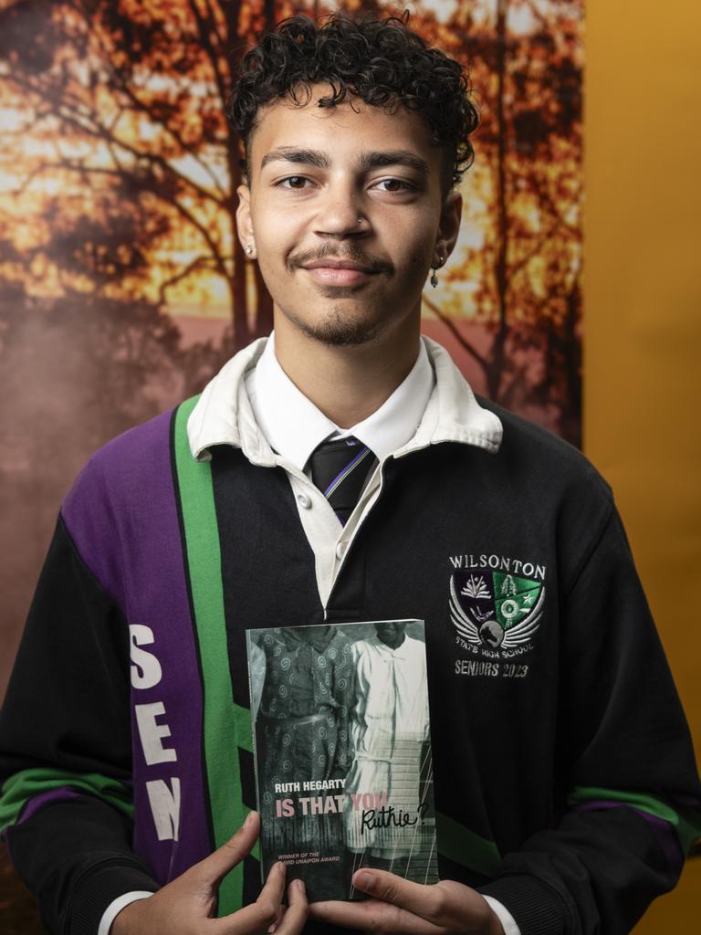 Yuluwirri Wightman of Wilsonton SHS with a signed copy of Is That You Ruthie? by Ruth Hegarty at the Queensland Aboriginal and Torres Strait Islander Foundation (QATSIF) graduation at UniSQ. Picture: Kevin Farmer