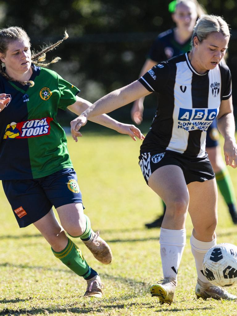 Rachael Copas (left) of Highfields and Shandell Robertson of Willowburn in FQPL Women Darling Downs Presidents Cup football at West Wanderers, Sunday, July 24, 2022. Picture: Kevin Farmer