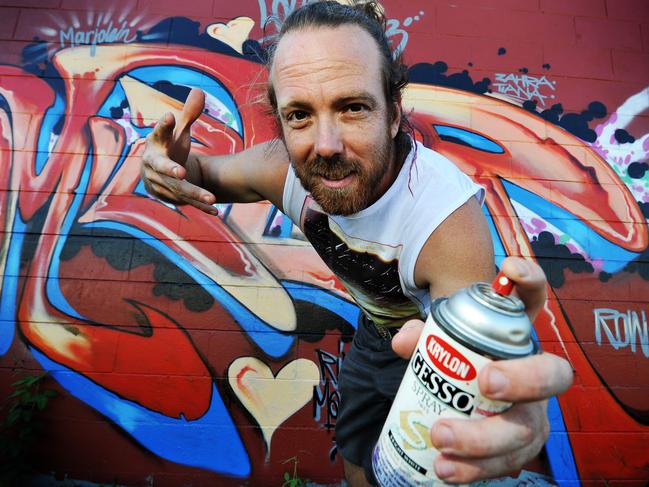 Hip hop singer and street artist Garth Jankovic has painted more than 1000 murals over the world and was one of the first street artists in Townsville. He is also just about to launch a hip-hop album under his band Realm City . Photo: Fiona Harding