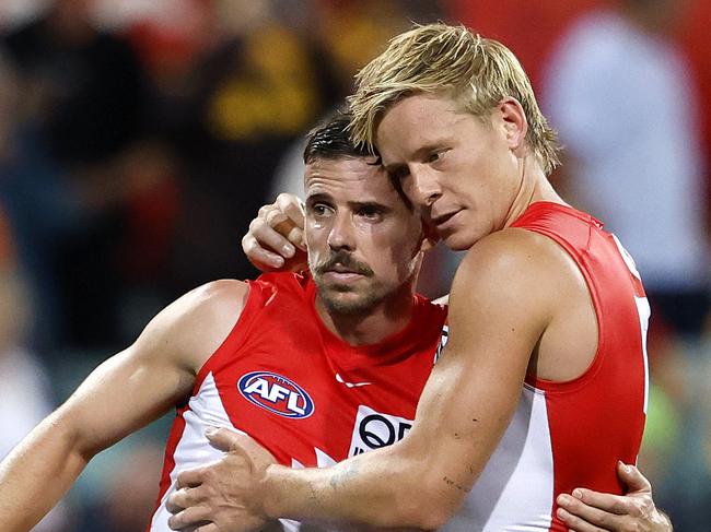 Jake Lloyd in game 250 is consoled by Isaac Heeney after the loss in the AFL Opening Round match between the Sydney Swans and Hawthorn Hawks at the SCG on March 7, 2025. Photo by Phil Hillyard (Image Supplied for Editorial Use only - **NO ON SALES** - Â©Phil Hillyard )