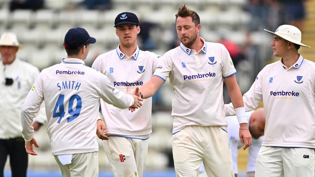 WORCESTER, ENGLAND - MAY 04: Ollie Robinson of Sussex celebrates with Steve Smith after taking the wicket of Matthew Waite of Worcestershire during the LV= Insurance County Championship Division 2 match between Worcestershire and Sussex at New Road on May 04, 2023 in Worcester, England. (Photo by Dan Mullan/Getty Images)