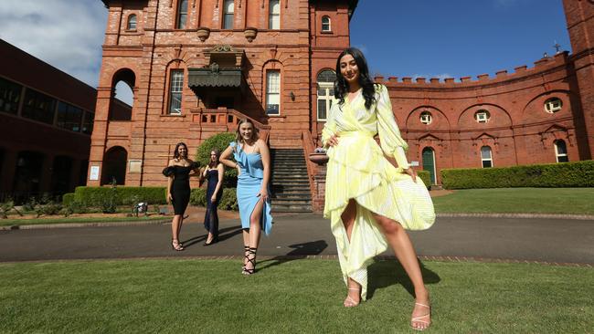 Year 12 students Jessica Guerrera, left, Julia Favotto, Claudia Tyree and Solange Shina at Sydney’s Santa Sabina College on Friday, will now have a formal. Picture: Britta Campion