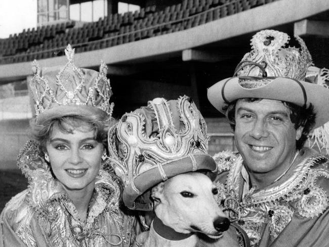 1985: Molly Meldrum and Anne Erickson with a greyhound at Olympic Park. Picture: HWT