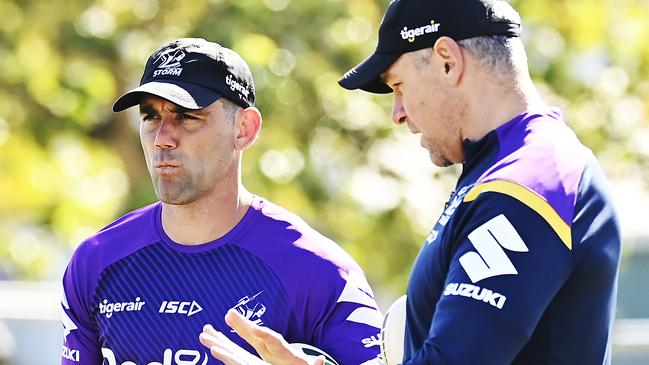 SUNSHINE COAST, AUSTRALIA - AUGUST 26: Cameron Smith is seen speaking with coaching staff during a Melbourne Storm NRL training session at Sunshine Coast Stadium on August 26, 2020 in Sunshine Coast, Australia. (Photo by Albert Perez/Getty Images)