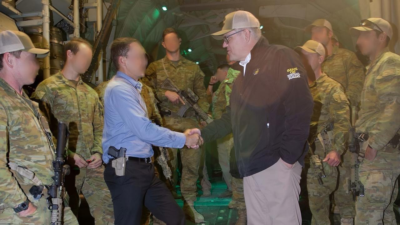 Scott Ryder with then Prime Minister Scott Morrison visiting troops in Afghanistan. Picture: Supplied