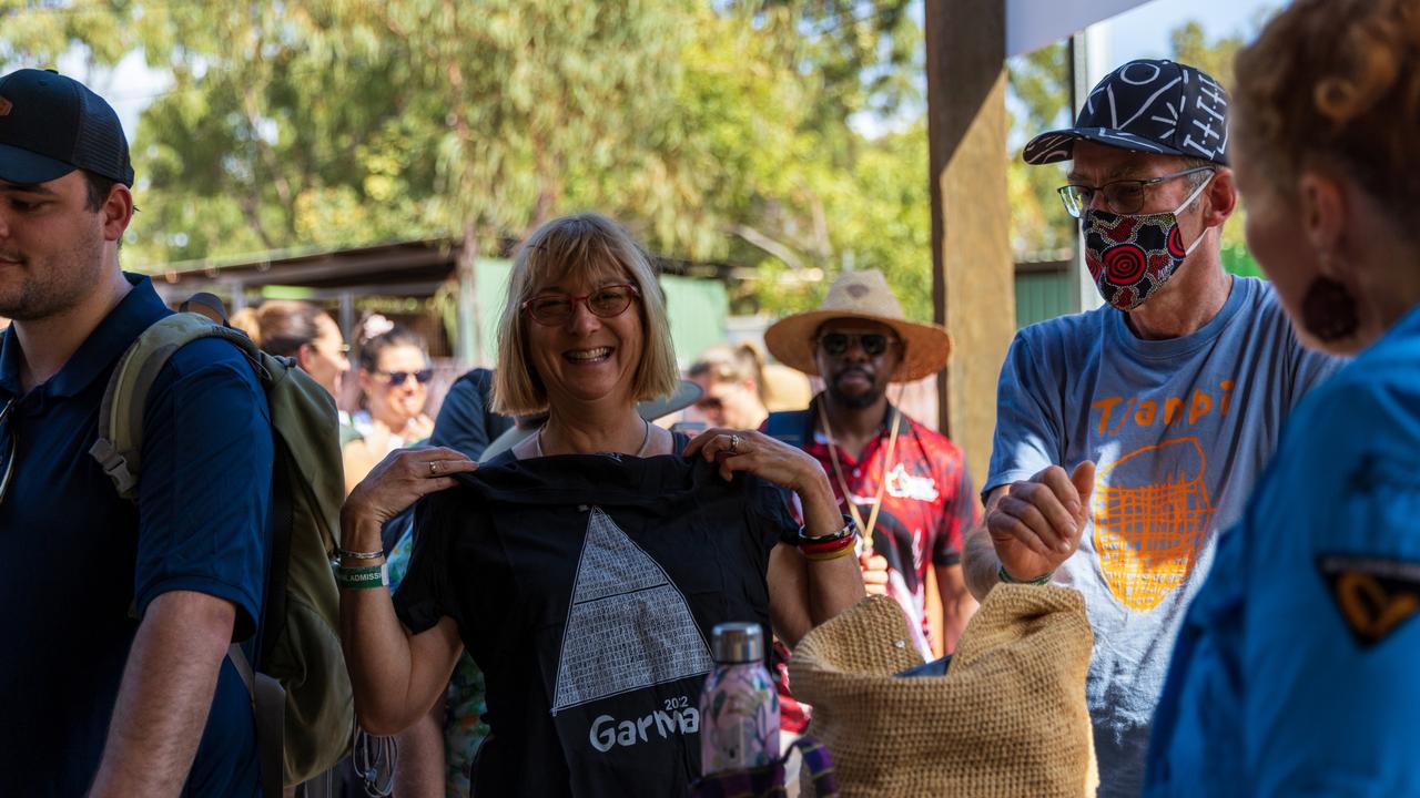 People queue in line at the Garma Merchandise store during Garma Festival 2022. Picture: Tamati Smith/ Getty Images