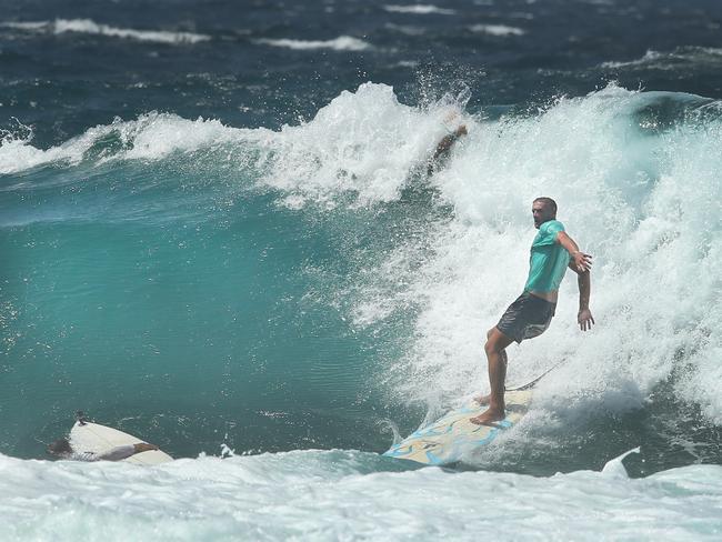 Powerful surf began hitting southern beaches this afternoon and locals hit the points before the Pro surfers arrive. However there were a few casualties at Snappers Rocks. Local Declan Sheeran broke a rib avoiding a surfer in the impact zone. Picture Glenn Hampson