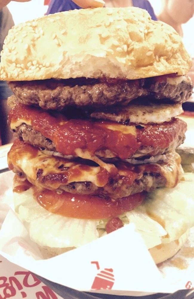 The ‘double trouble’ burger at Johnny’s Burger Joint. Photo from Justin W on Yelp.