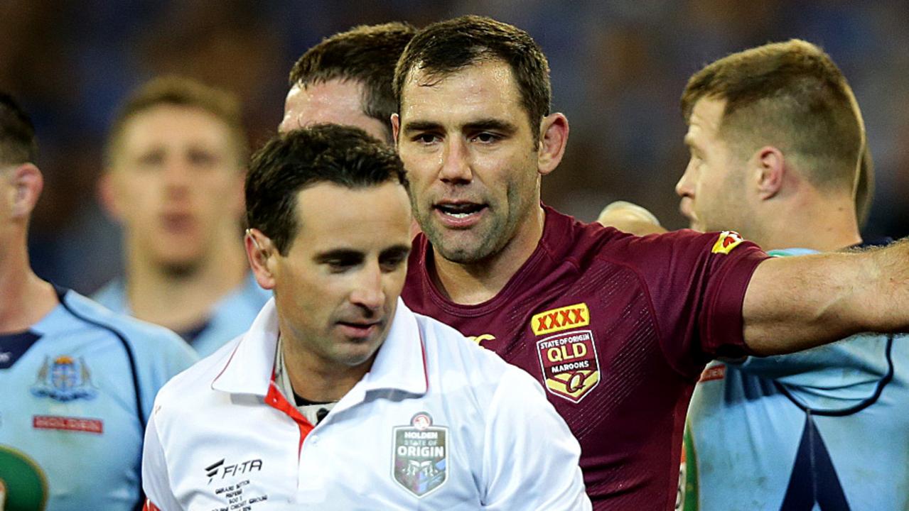 Cameron Smith has a few words with referee Gerard Sutton during a State of Origin game. Picture Gregg Porteous