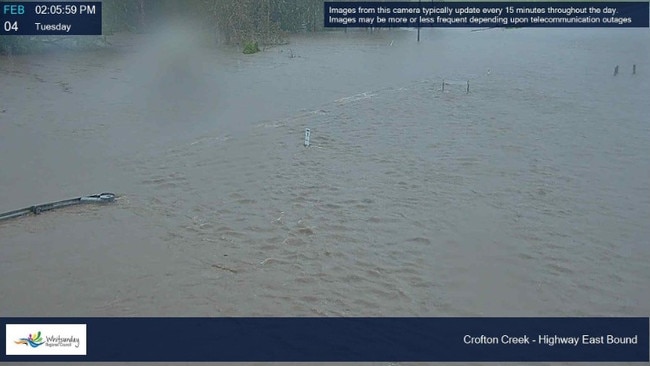 Crofton Creek Bridge is underwater as of 2.22pm Tuesday, February 4, 2025 as the Whitsundays is soaked. Image: Whitsunday Regional Council flood cameras