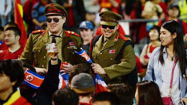 Fans of North Korea and China cheer add to the colour in Canberra.