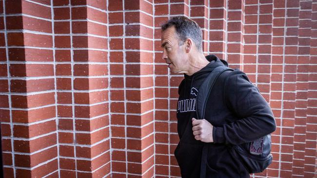 Alastair Clarkson arrives to work on the first day of coaching at North Melbourne. Clarkson has always been keen to tell his story to the Hawthorn investigation.