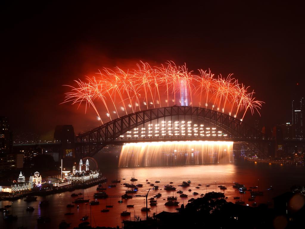 Fireworks light up the sky above Sydney Harbour during the midnight fireworks display during New Year's Eve celebrations on January 1st, 2020 in Sydney, Australia. (Photo by Cameron Spencer/Getty Images)