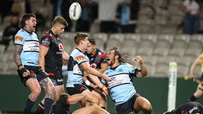 Toby Rudolf scored the first try of his NRL career to regain the lead for the Sharks. Picture: Getty Images.