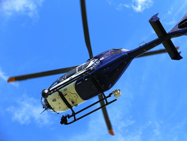 A Queensland Police helicopter was used to help track the teens. Picture: David Clark.