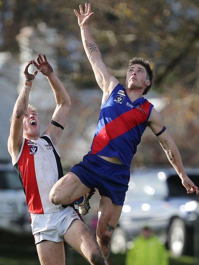 Terang-Mortlake’s Luke McConnel and Koroit’s Mac Petersen compete for the ball.