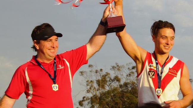 Olinda Ferny Creek coach Brendan Donovan and captain Dylan Wilson celebrate the 2017 premiership win.   Picture: Robyn Kuys