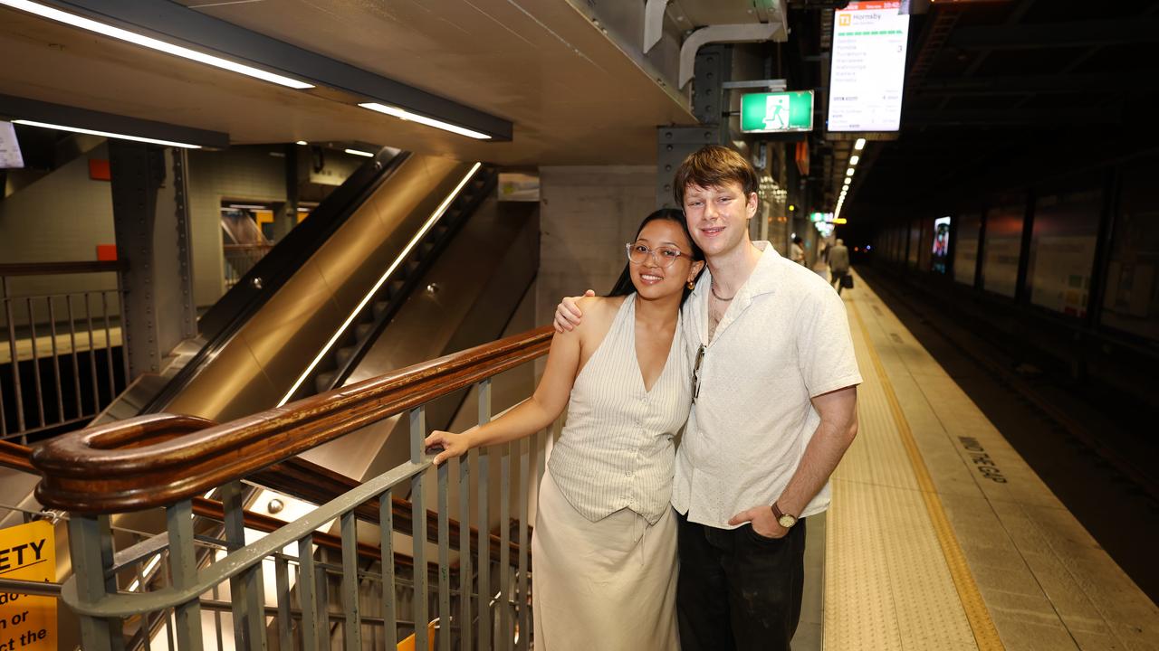 Laura Moe and Patrick Crown-Milliss are among the hordes of people who are back using public transport. Picture: Rohan Kelly