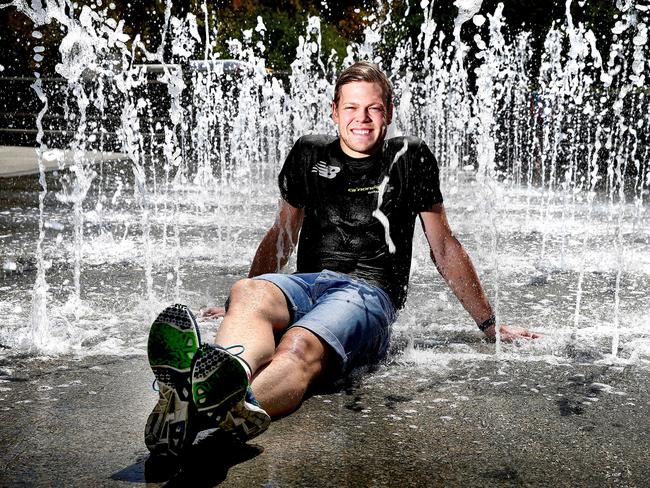 Danish cyclist Lasse Hansen, an Olympic gold medallist, cools off in Victoria Square after arriving in Adelaide for the Tour Down Under. Picture: Mike Burton