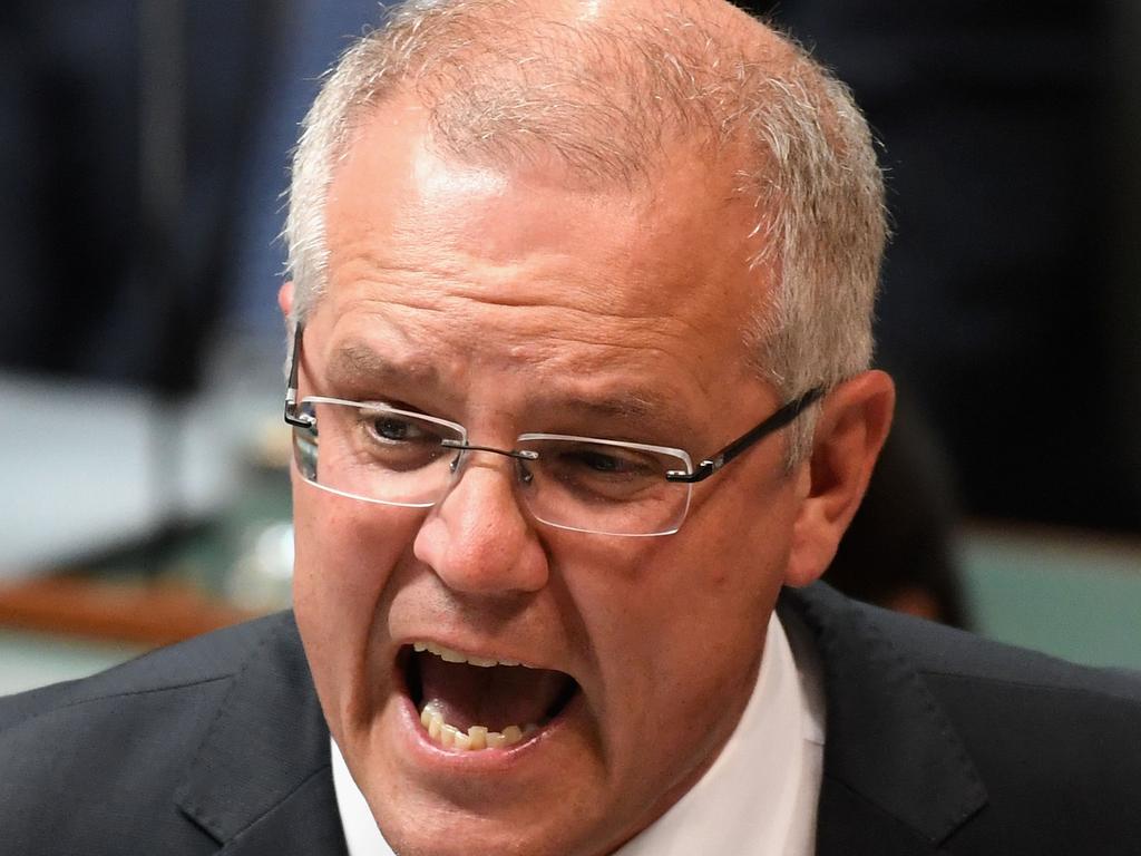 Prime Minister Scott Morrison reacts during question time at Parliament House on Monday. Picture: Tracey Nearmy/Getty Images