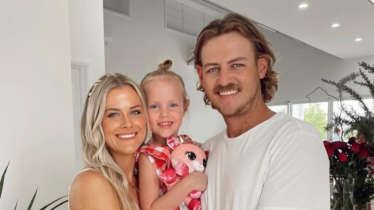 Jack Palmer with partner Emily Nash and daughter Lola.