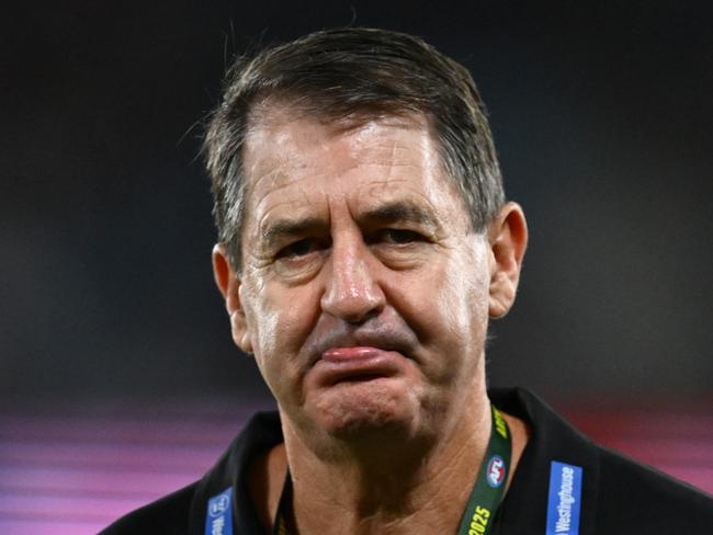 MELBOURNE, AUSTRALIA - APRIL 26: Ross Lyon the coach of the Saints looks on during the round seven AFL match between St Kilda Saints and Brisbane Lions at Marvel Stadium, on April 26, 2025, in Melbourne, Australia. (Photo by Quinn Rooney/Getty Images)