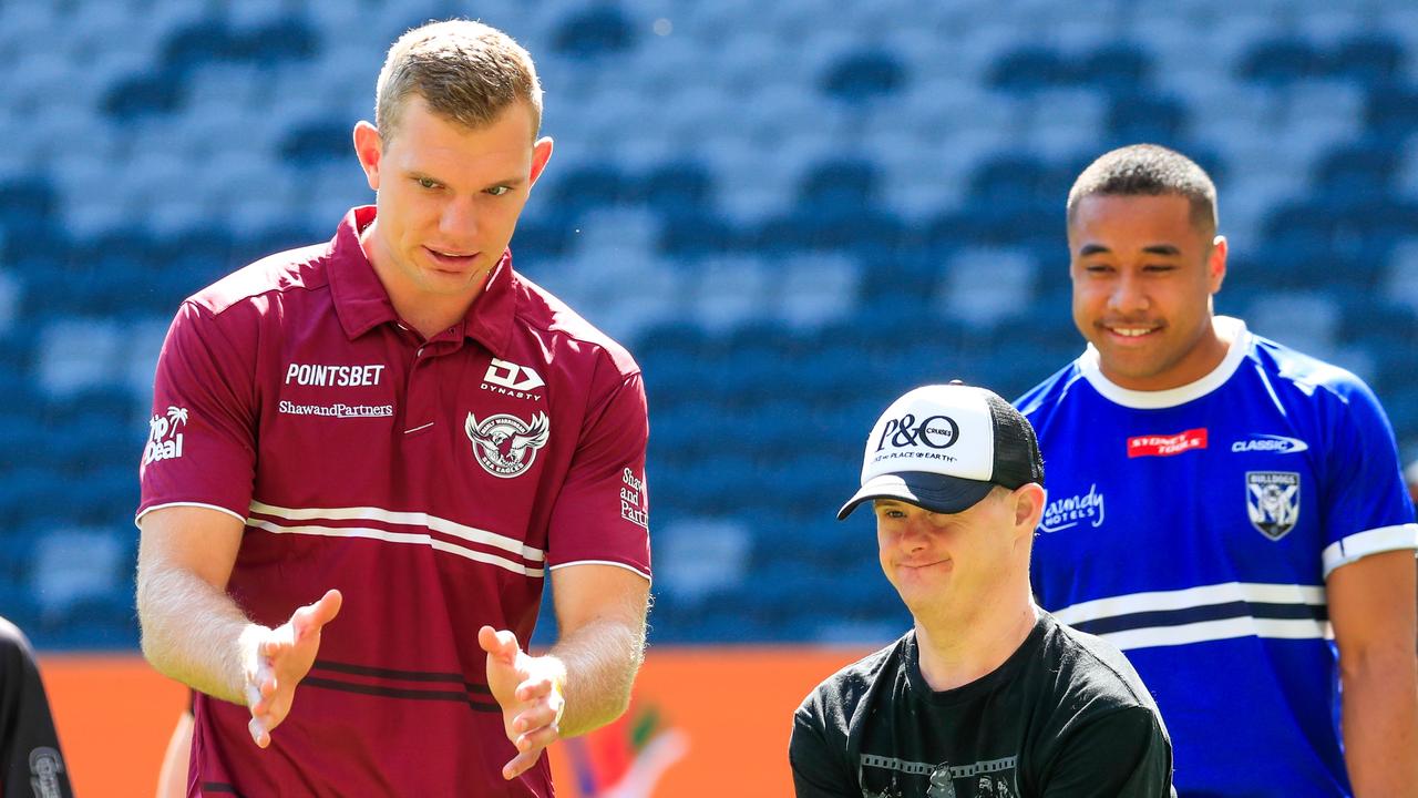 Tom Trbojevic put plenty of smiles on faces helping out on Interntional Day of People with Disability at CommBank Stadium.